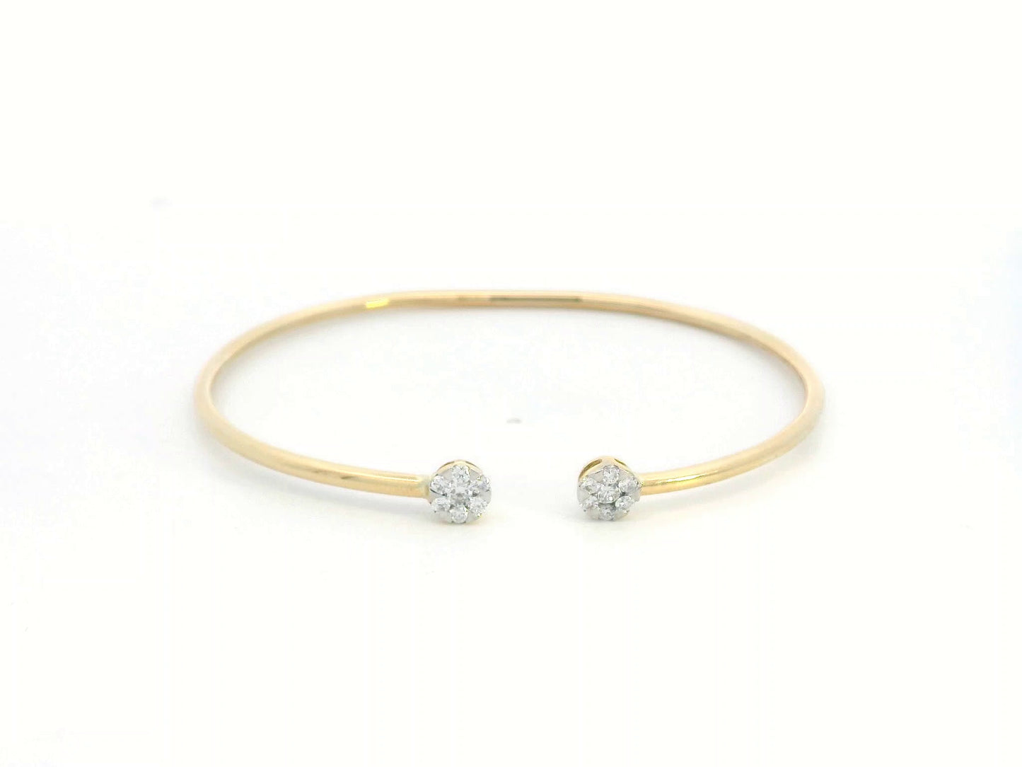 18K gold open bangle with round diamond cluster ends totaling 0.46 carats