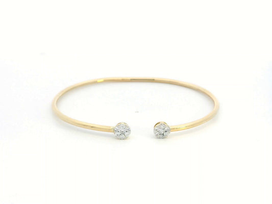 18K gold open bangle with round diamond cluster ends totaling 0.46 carats