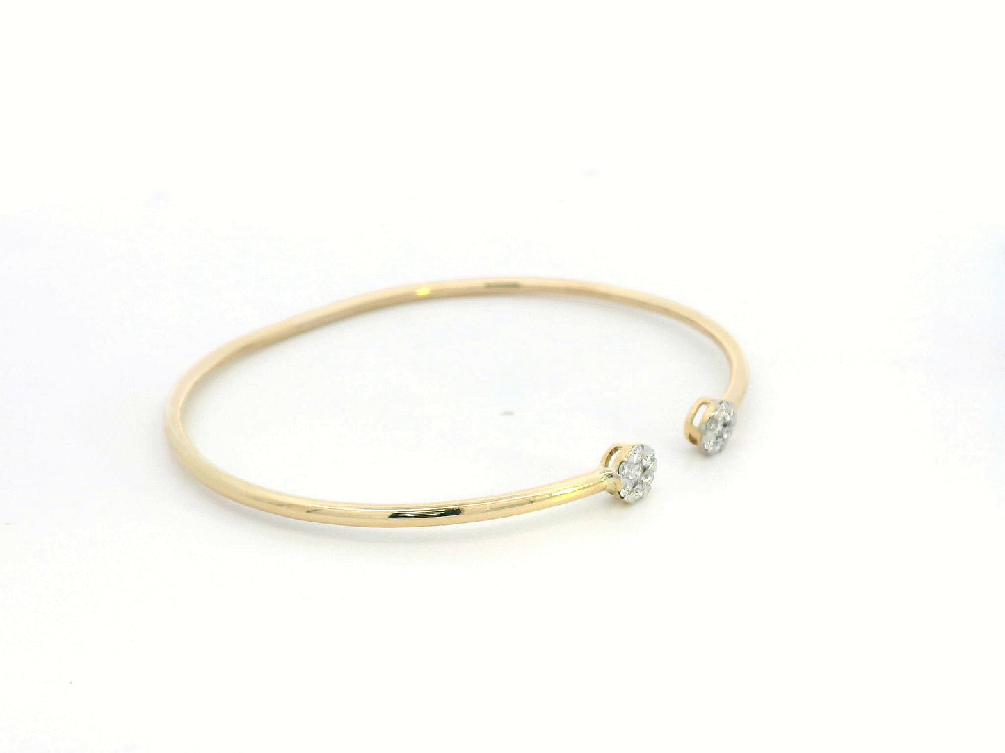 18K gold open bangle with round diamond cluster ends totaling 0.46 carats