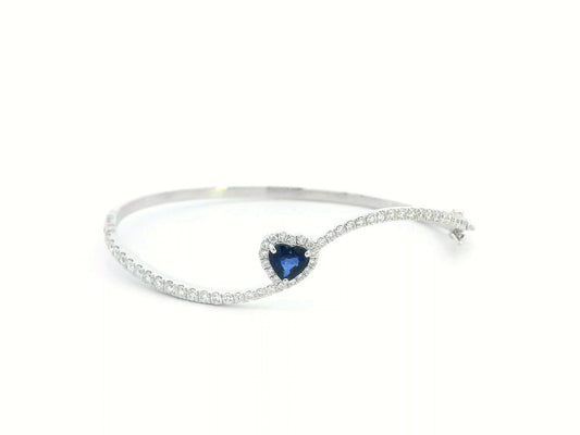 18K white gold bangle with heart-shaped 0.73ct blue sapphire and 1.2ct diamond halo and accents