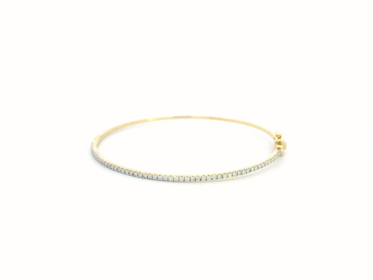 18K gold diamond bangle bracelet featuring 0.55 carats of round-cut diamonds, designed for timeless elegance and luxury.