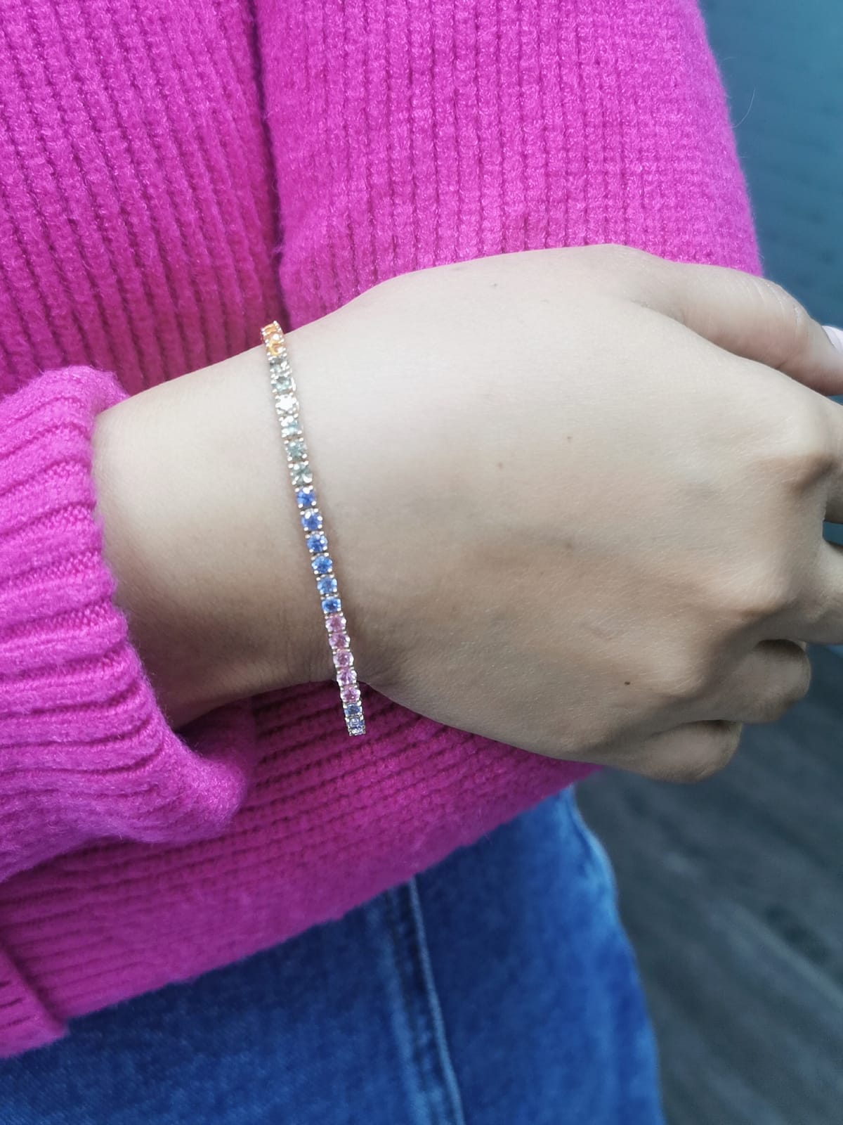 18K Rose Gold Multi-Sapphire Tennis Bracelet featuring 6.61 carats of vibrant round-cut sapphires in a classic design