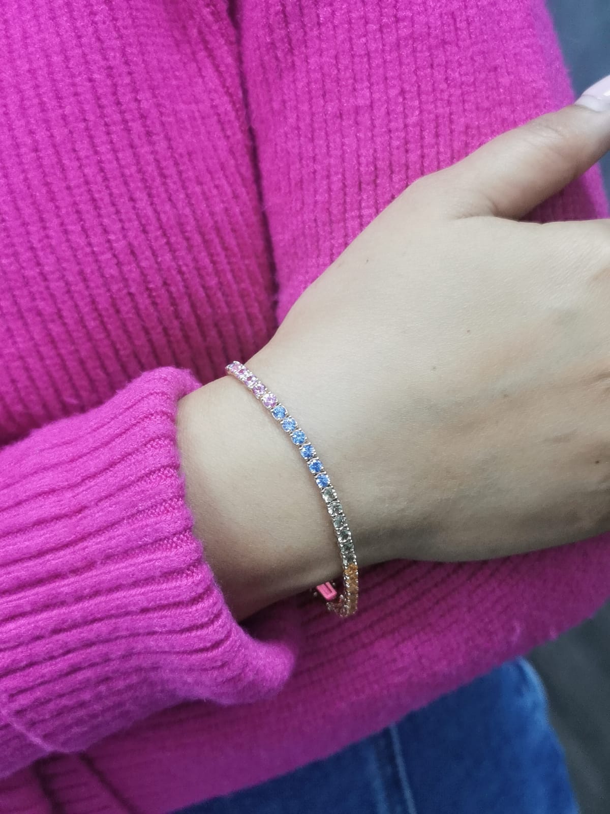 18K Rose Gold Multi-Sapphire Tennis Bracelet featuring 6.61 carats of vibrant round-cut sapphires in a classic design