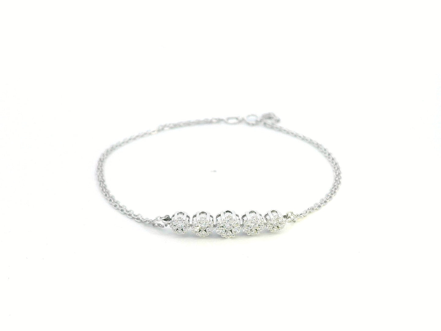 Diamond floral cluster bracelet in 18K white gold with 0.55 carat total diamond weight by Emirates Diamonds