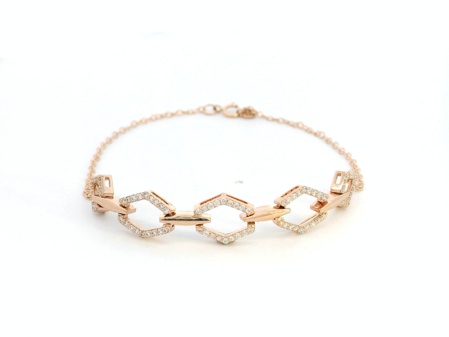 18K gold bracelet with five diamond-encrusted hexagon links and chain-link design