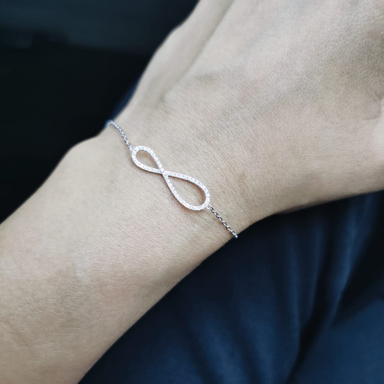 18K White Gold Infinity Bracelet with 0.23 Carat Diamonds