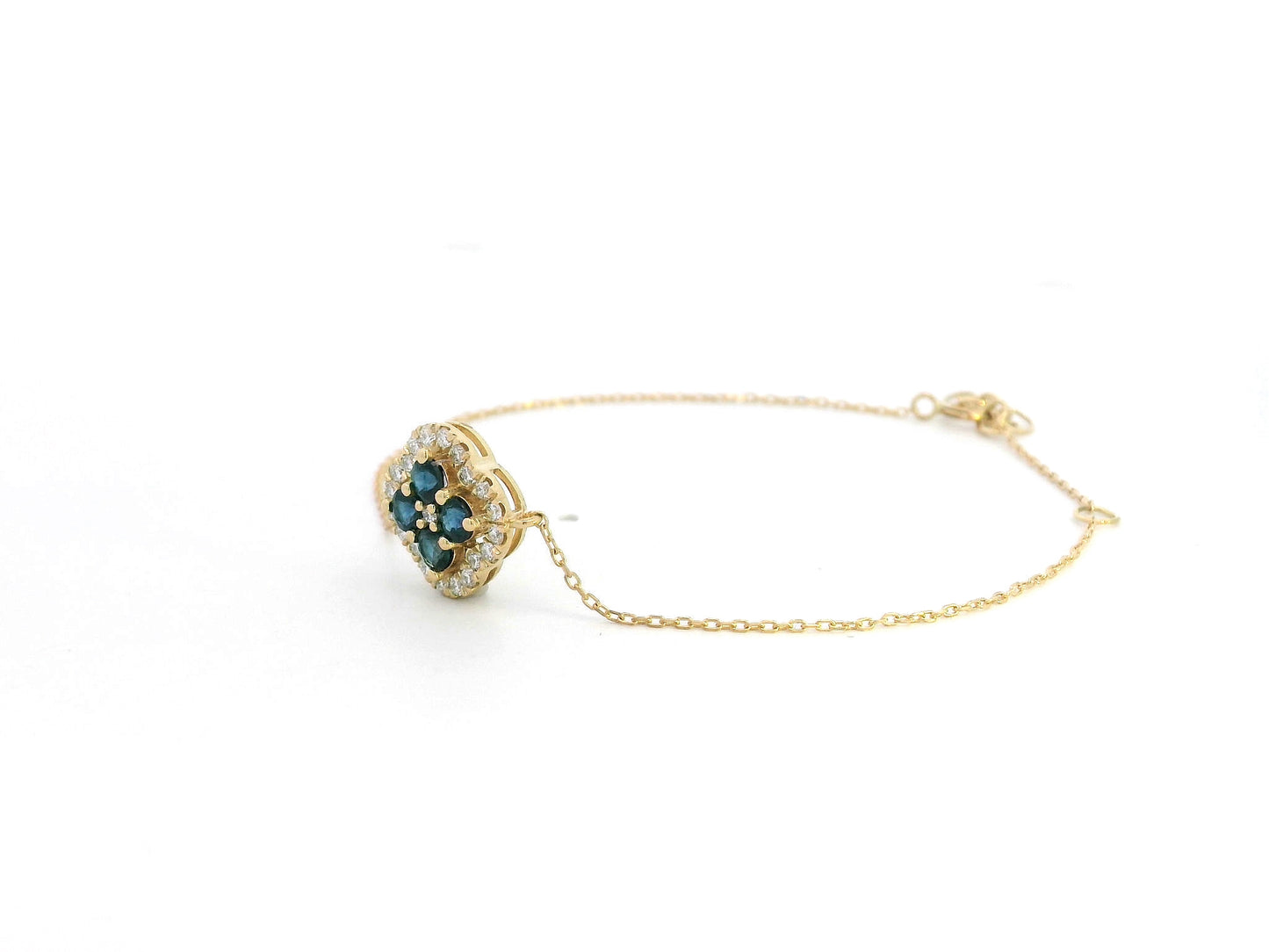 18K gold bracelet with floral blue sapphires and white diamond halo
