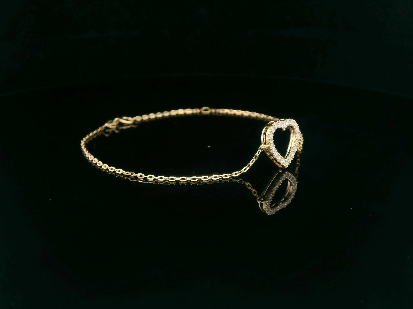 18K yellow gold chain bracelet with pavé diamond open heart charm – 0.32 carats