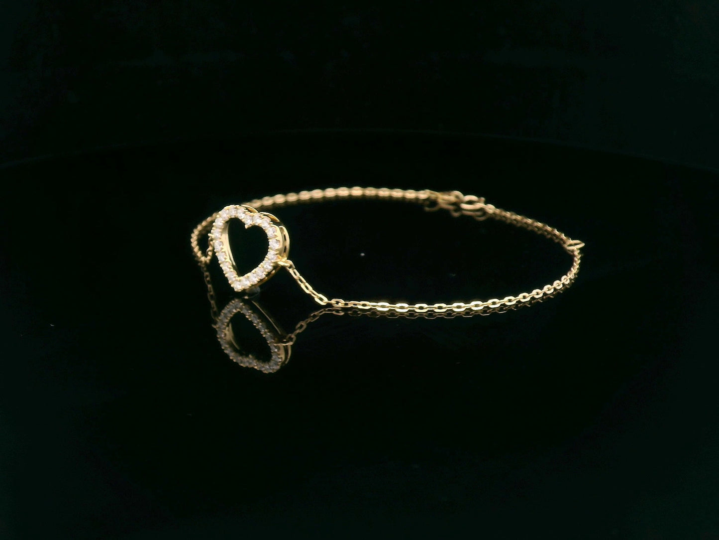 18K yellow gold chain bracelet with pavé diamond open heart charm – 0.32 carats