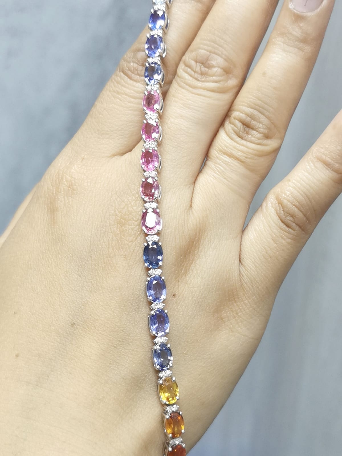 18K white gold multi-color sapphire bracelet with diamond accents by Emirates Diamonds
