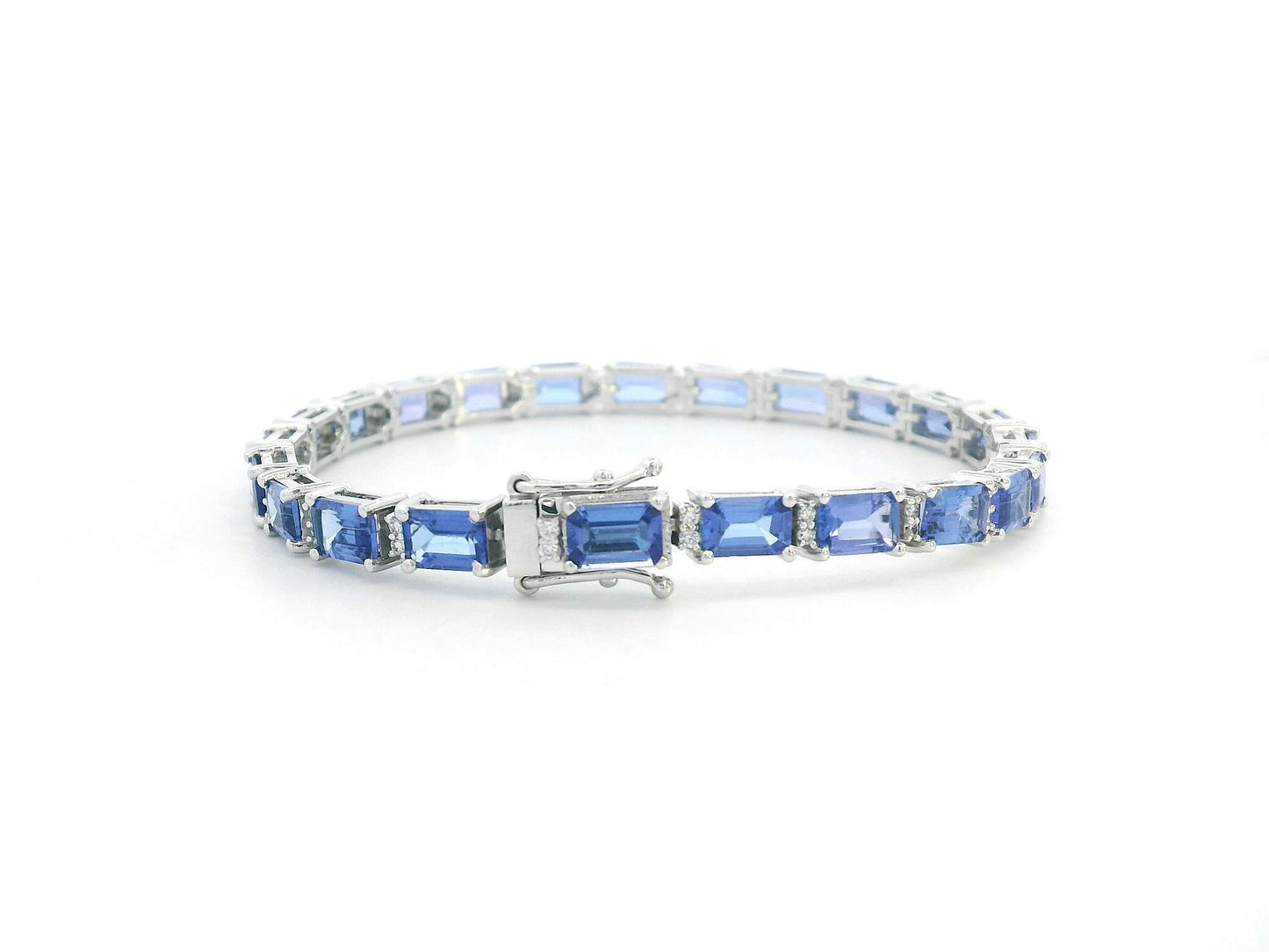 Close-up of tanzanite tennis bracelet with secure clasp detail