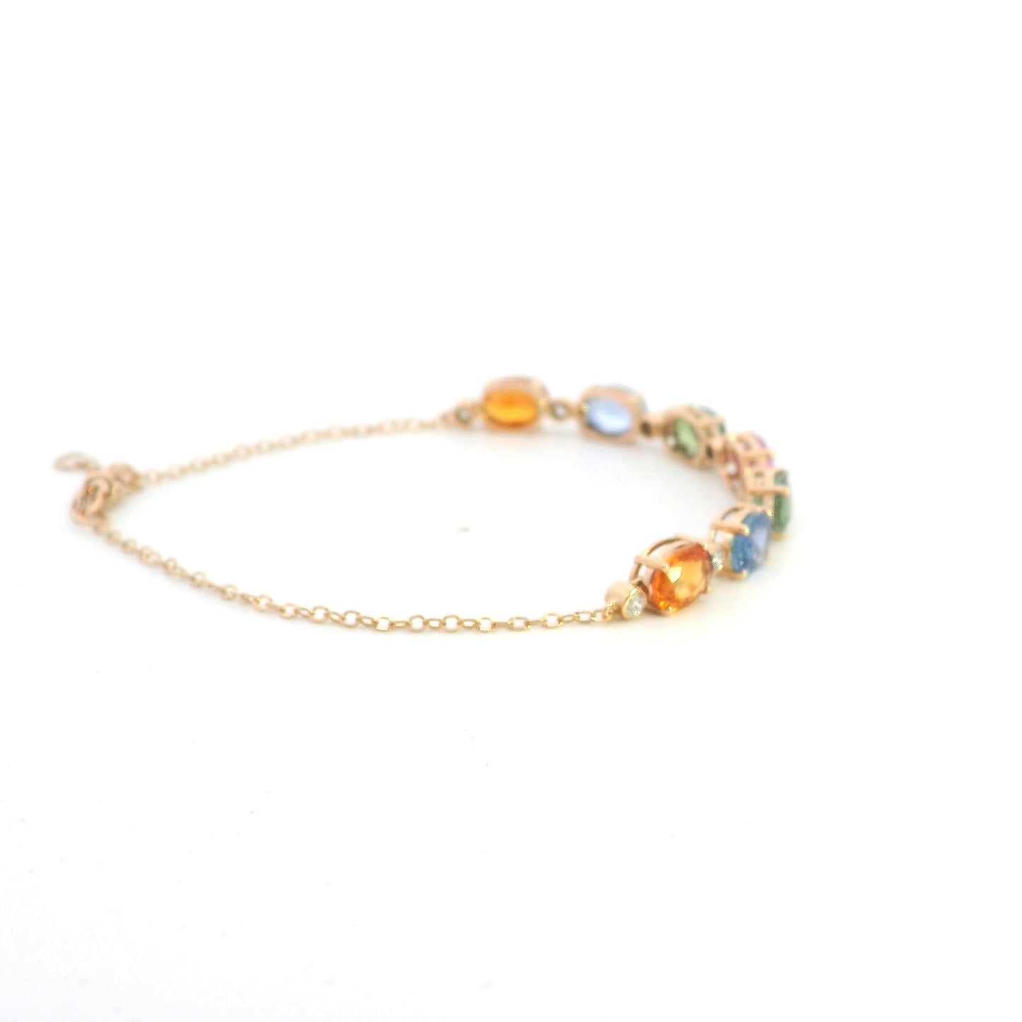 Multi color sapphire and diamond bracelet in 18K rose gold with oval pastel gemstones