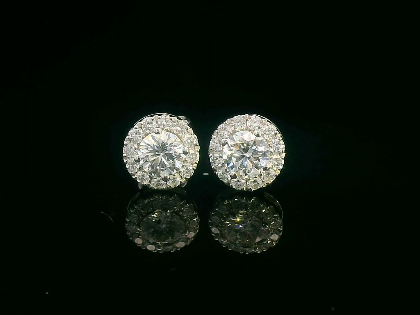18K Gold Round Cut Diamond Halo Stud Earrings with 0.61 ct center diamonds and 0.26 ct halo diamonds