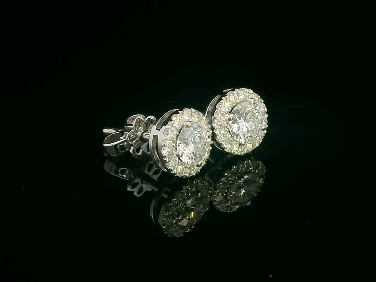 18K Gold Round Cut Diamond Halo Stud Earrings with 0.61 ct center diamonds and 0.26 ct halo diamonds