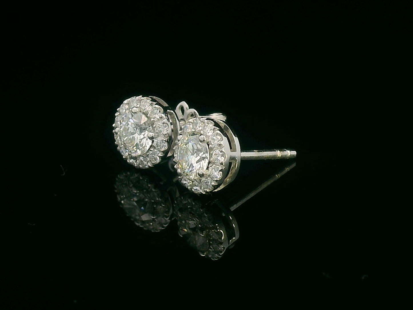 18K Gold Round Cut Diamond Halo Stud Earrings with 0.61 ct center diamonds and 0.26 ct halo diamonds