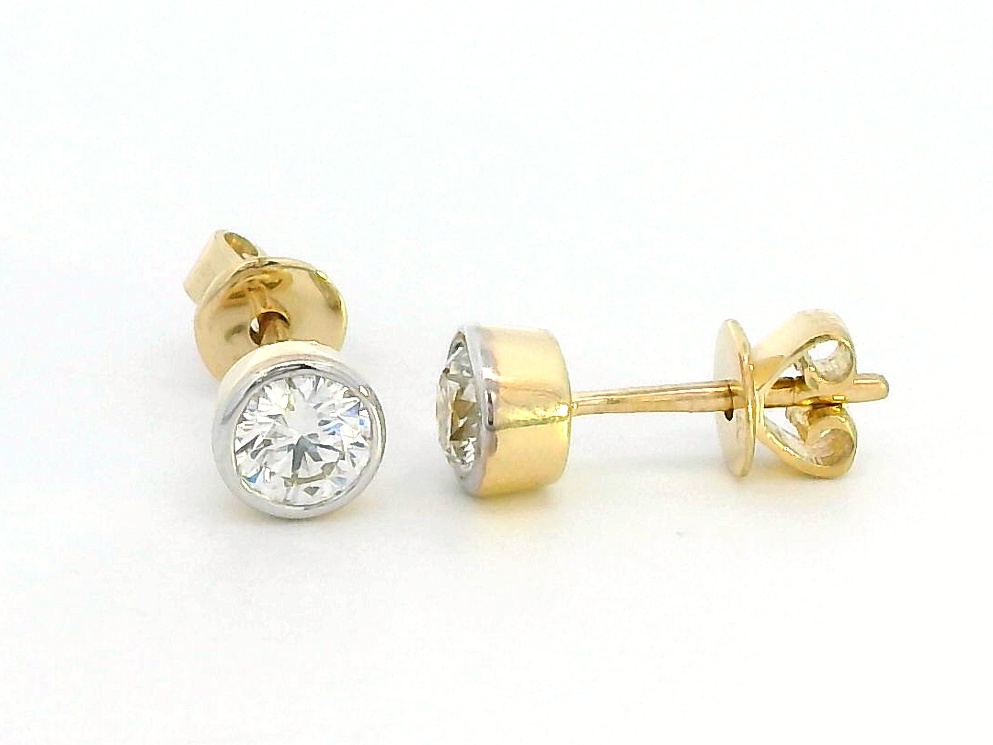 Round-Cut Diamond Studs in Bezel Setting – Elegant Fine Jewelry