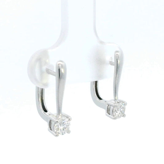 18K gold diamond huggie hoop earrings with 0.45-carat natural diamonds, featuring a secure and elegant design.