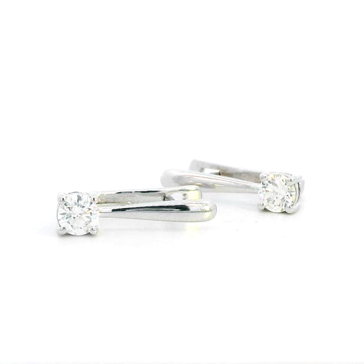 18K gold diamond huggie hoop earrings with 0.45-carat natural diamonds, featuring a secure and elegant design.