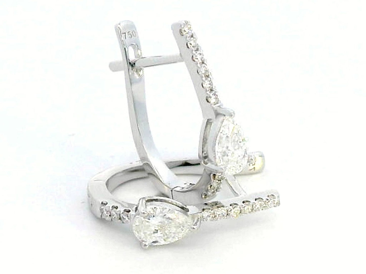 A pair of 18K gold hoop earrings featuring pear-shaped diamonds (0.41ct total) and accent diamonds (0.09ct total), elegantly designed for a timeless look.