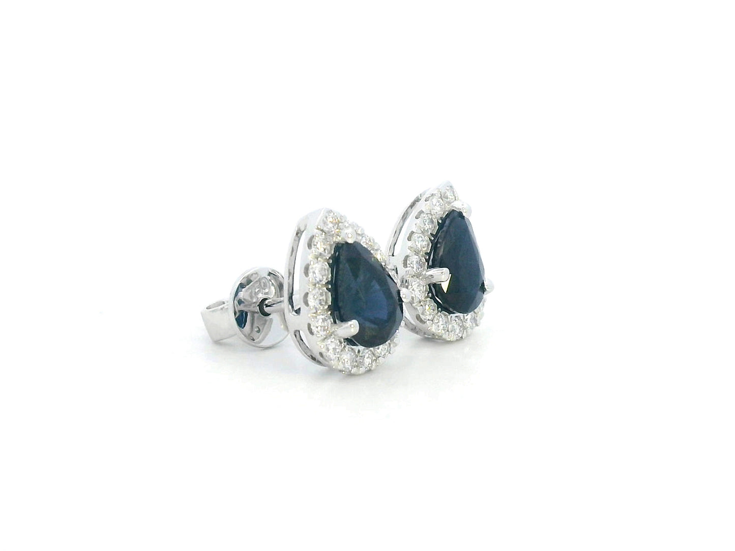 18K white gold pear-shaped blue sapphire and diamond halo stud earrings featuring 1.92 carats of blue sapphires and 0.38 carats of diamonds.