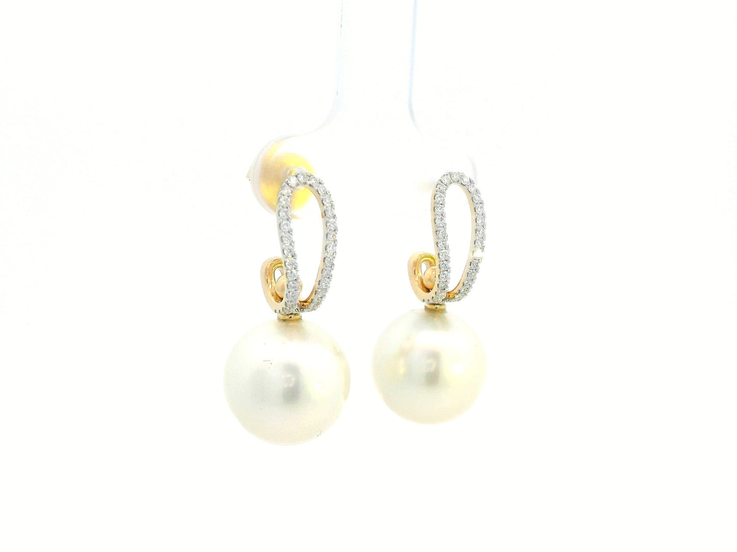 Elegant 18K gold drop earrings with South Sea white pearls (9x13mm) and 0.29ct diamond accents.