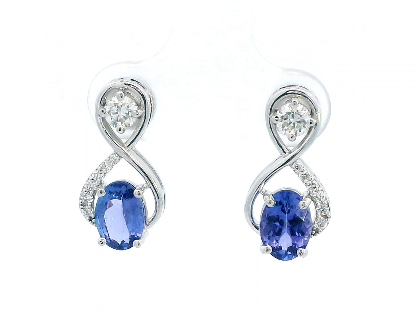 1.79 Carat Tanzanite and 0.40 Carat Diamond Earrings in 18K Gold, elegant gemstone earrings with a swirl design