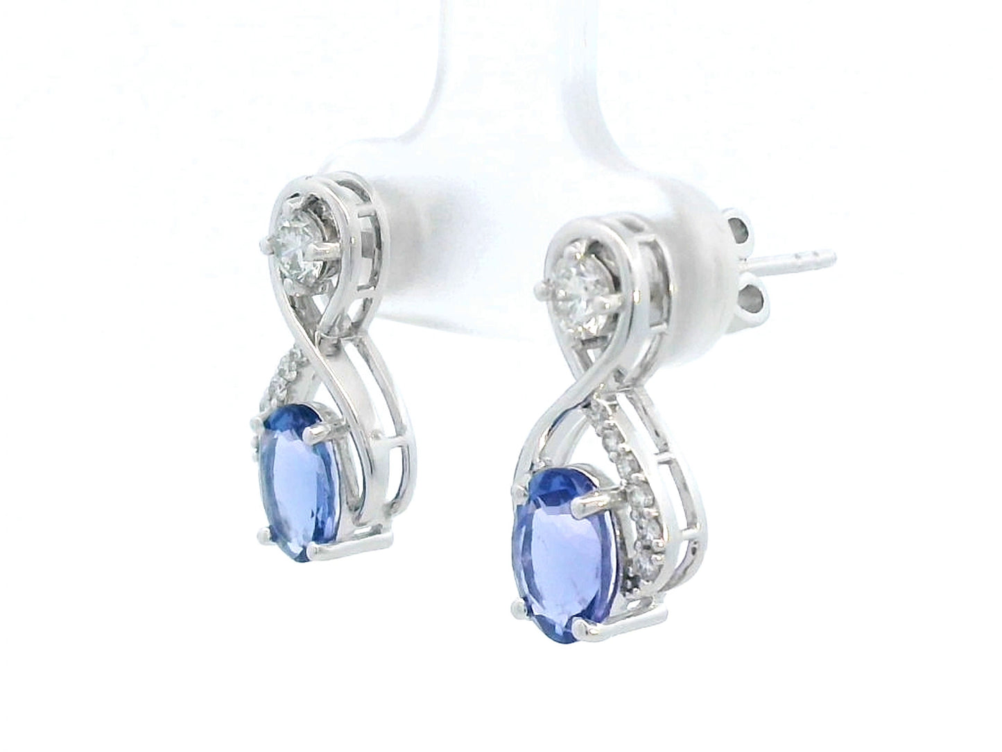 1.79 Carat Tanzanite and 0.40 Carat Diamond Earrings in 18K Gold, elegant gemstone earrings with a swirl design