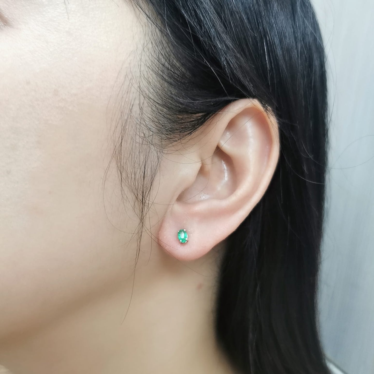 18K gold oval emerald earrings featuring 0.43 carats of natural green emeralds – dainty and minimalist birthstone jewelry, perfect for stacking