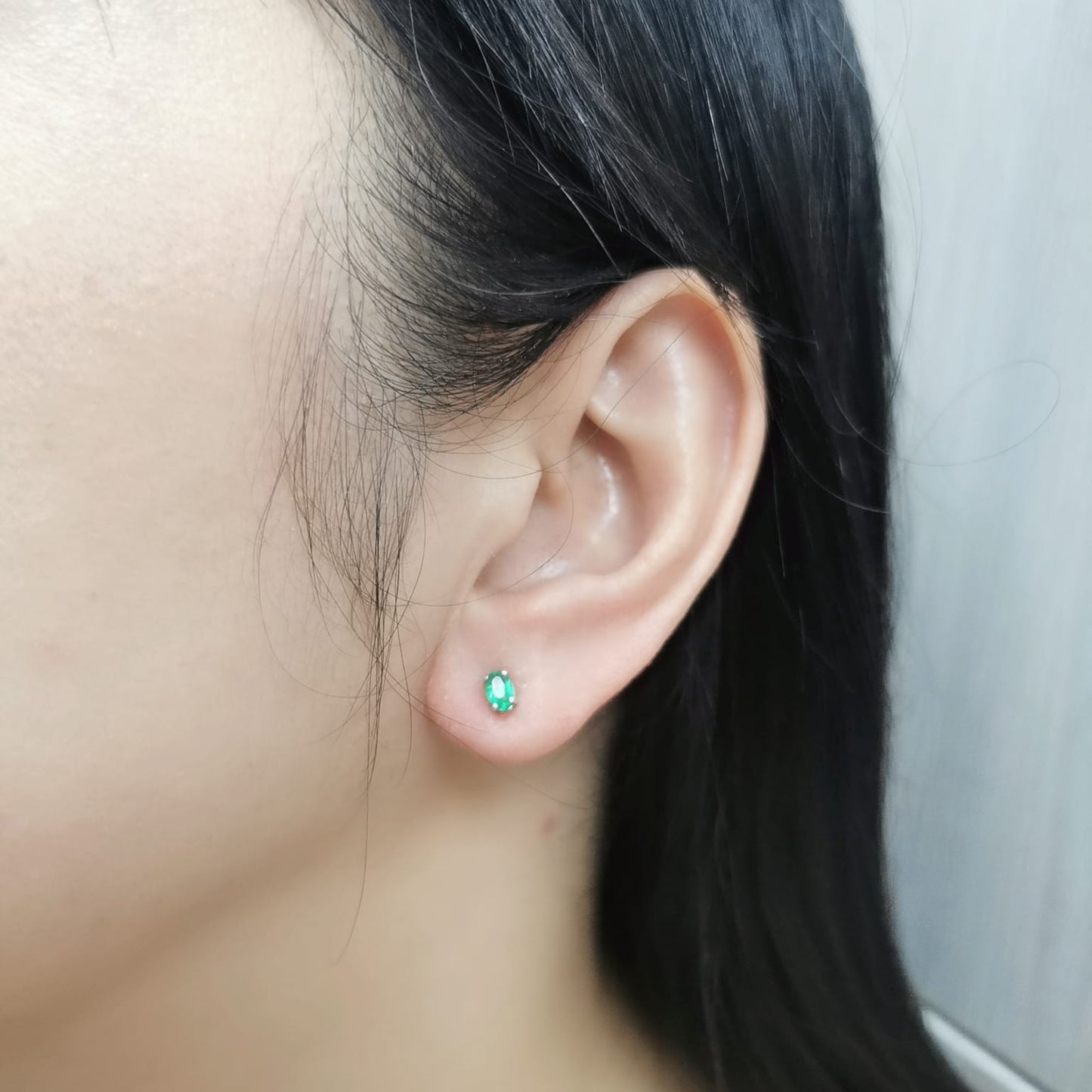 18K gold oval emerald earrings featuring 0.43 carats of natural green emeralds – dainty and minimalist birthstone jewelry, perfect for stacking