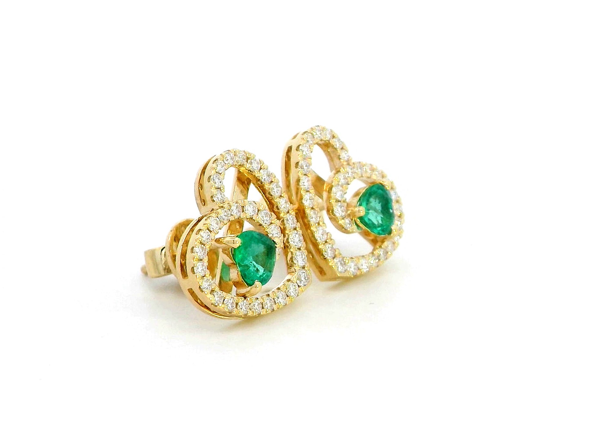 18K gold heart-shaped emerald and diamond earrings featuring 0.55 carats of emeralds and 0.52 carats of diamonds – romantic and elegant birthstone jewelry.