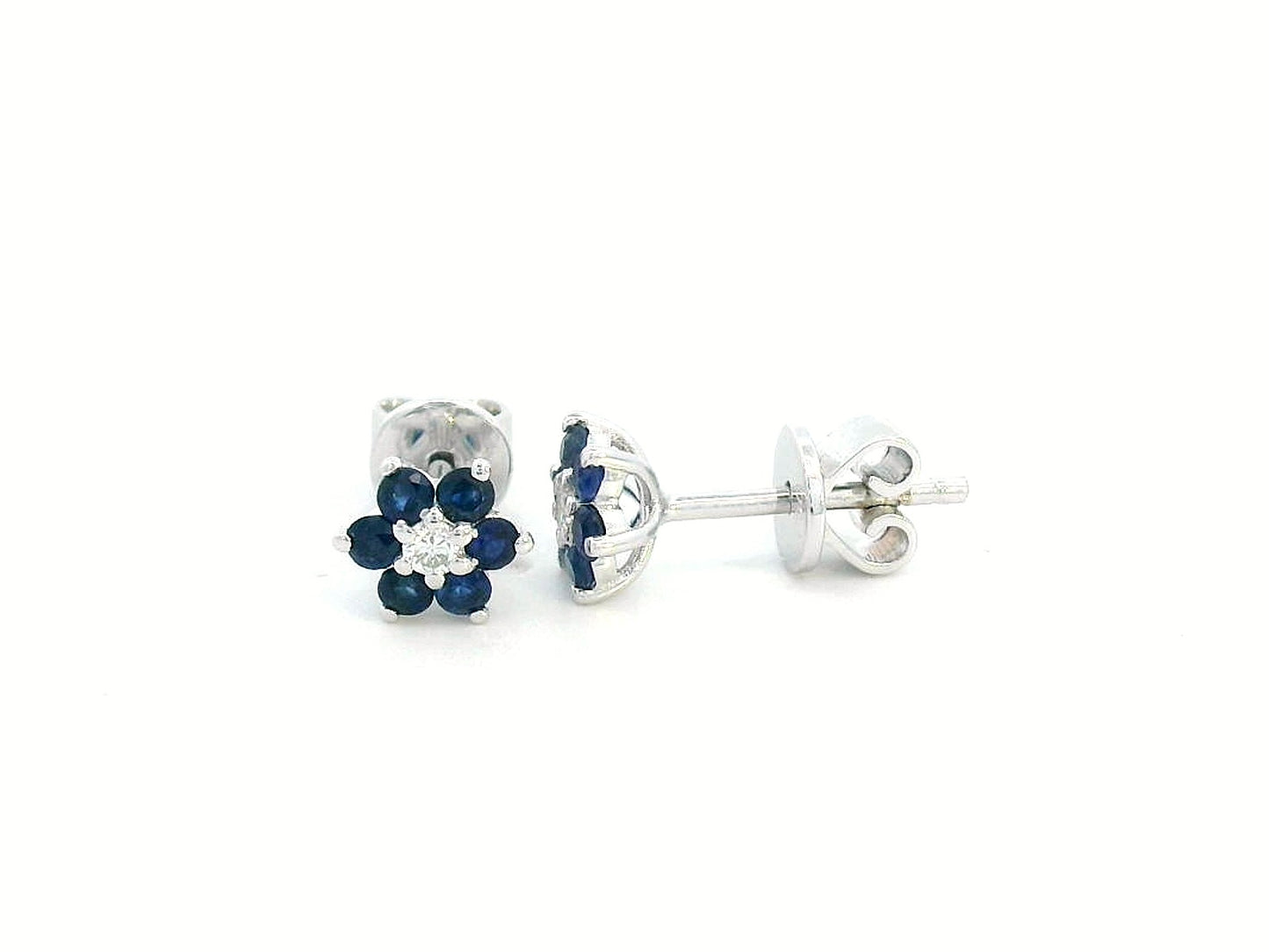 Elegant 18K gold sapphire and diamond flower stud earrings featuring 0.33 carats of blue sapphires and 0.05 carats of diamonds. A timeless floral design.