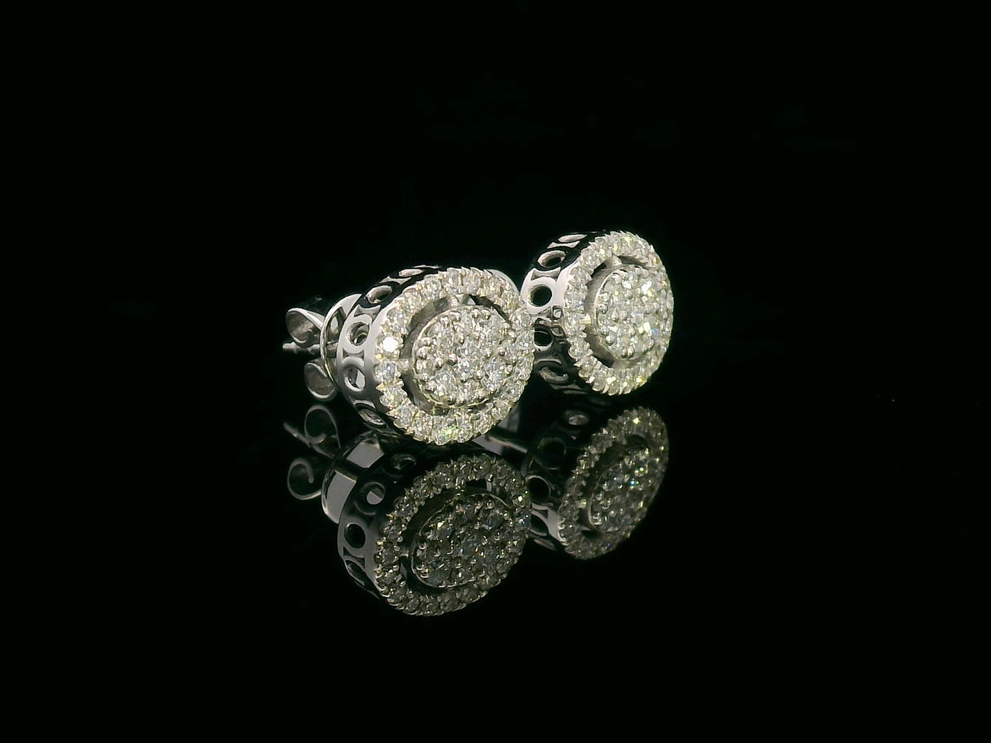 18K gold diamond halo stud earrings featuring 0.42ct diamonds for an elegant and timeless look.