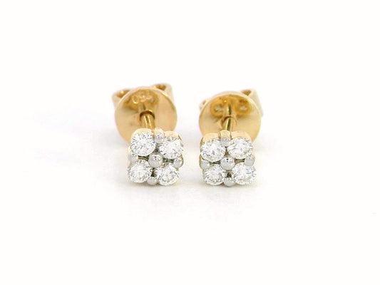 18K gold floral diamond stud earrings with round-cut diamonds, delicate flower design.