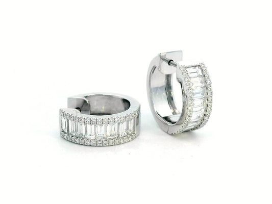 18K gold huggie hoop earrings with 1.58ct baguette and round diamonds. Elegant and timeless.
