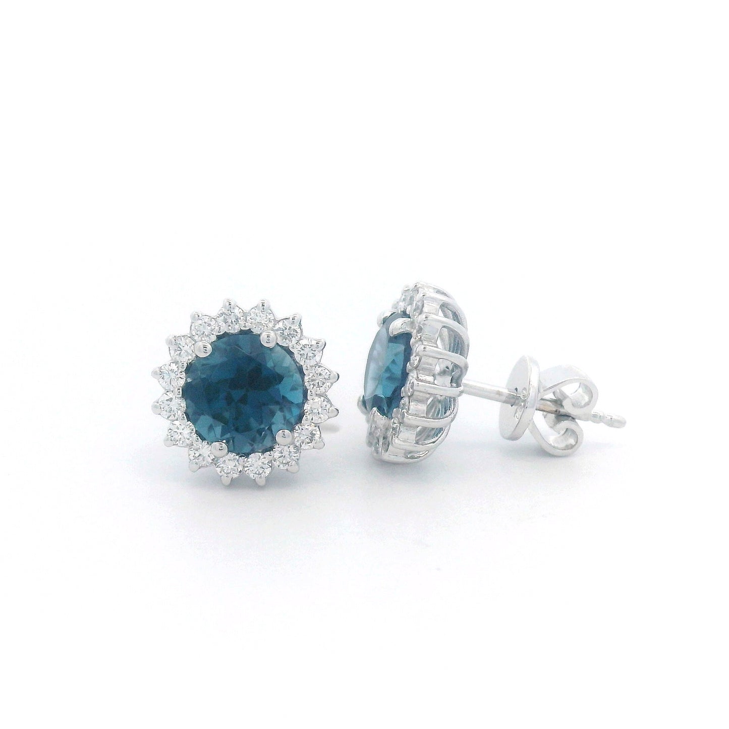 18K white gold earrings featuring London Blue Topaz with a diamond halo, totaling 1.91 carats of topaz and 0.36 carats of diamonds.