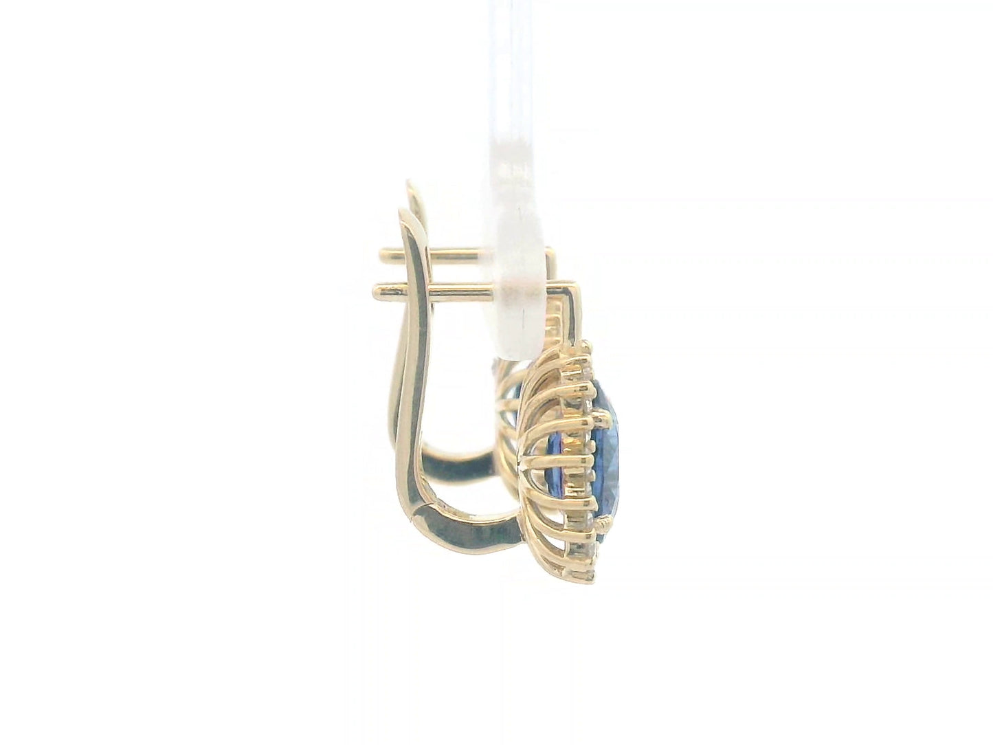 18K gold earrings featuring oval-cut Blue Sapphires (4.36ct) surrounded by a 0.56ct diamond halo, secured with hinged lever-back closures for a comfortable and elegant fit.