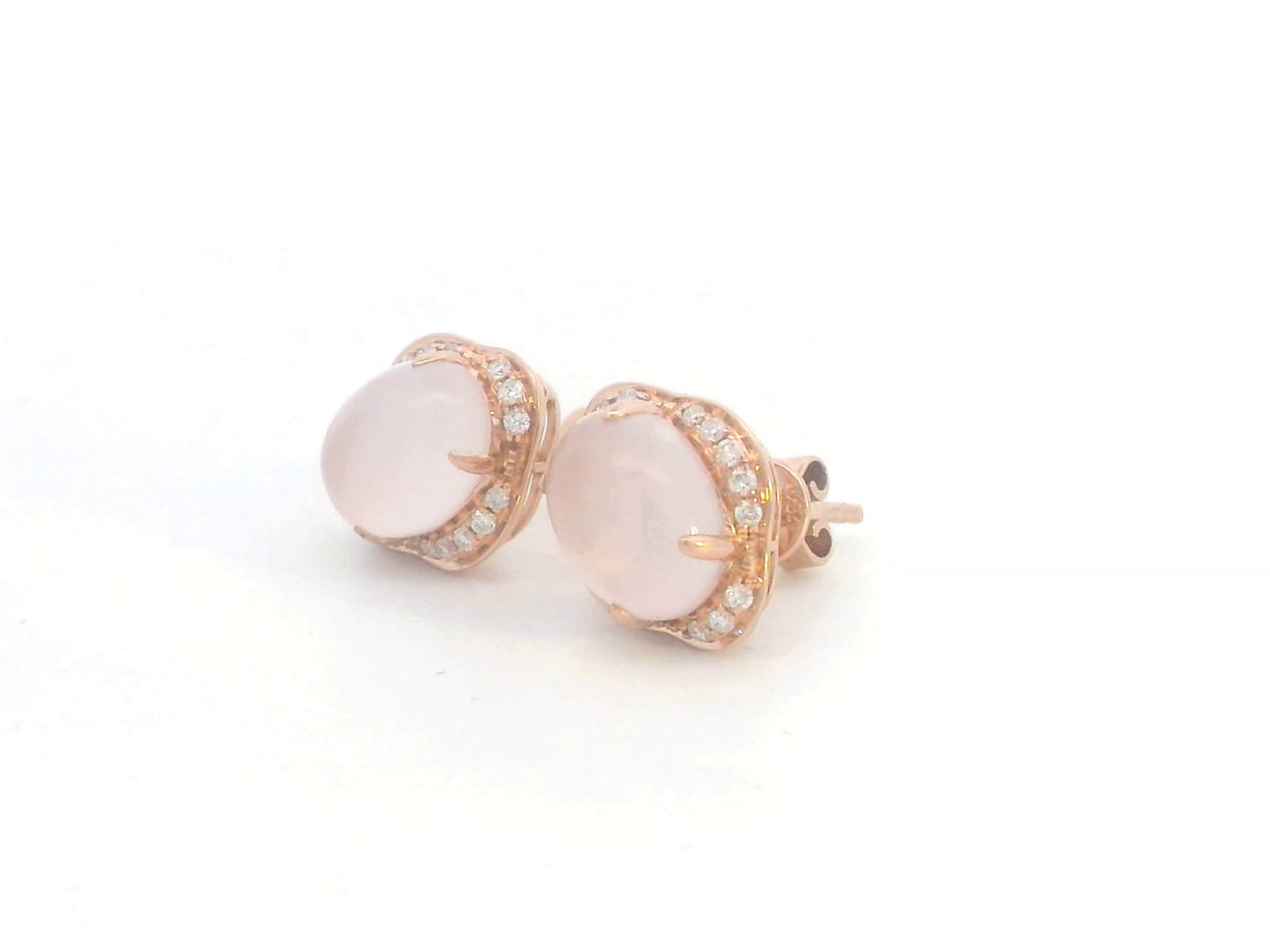 18K rose gold stud earrings with oval-cut rose quartz and a diamond halo.