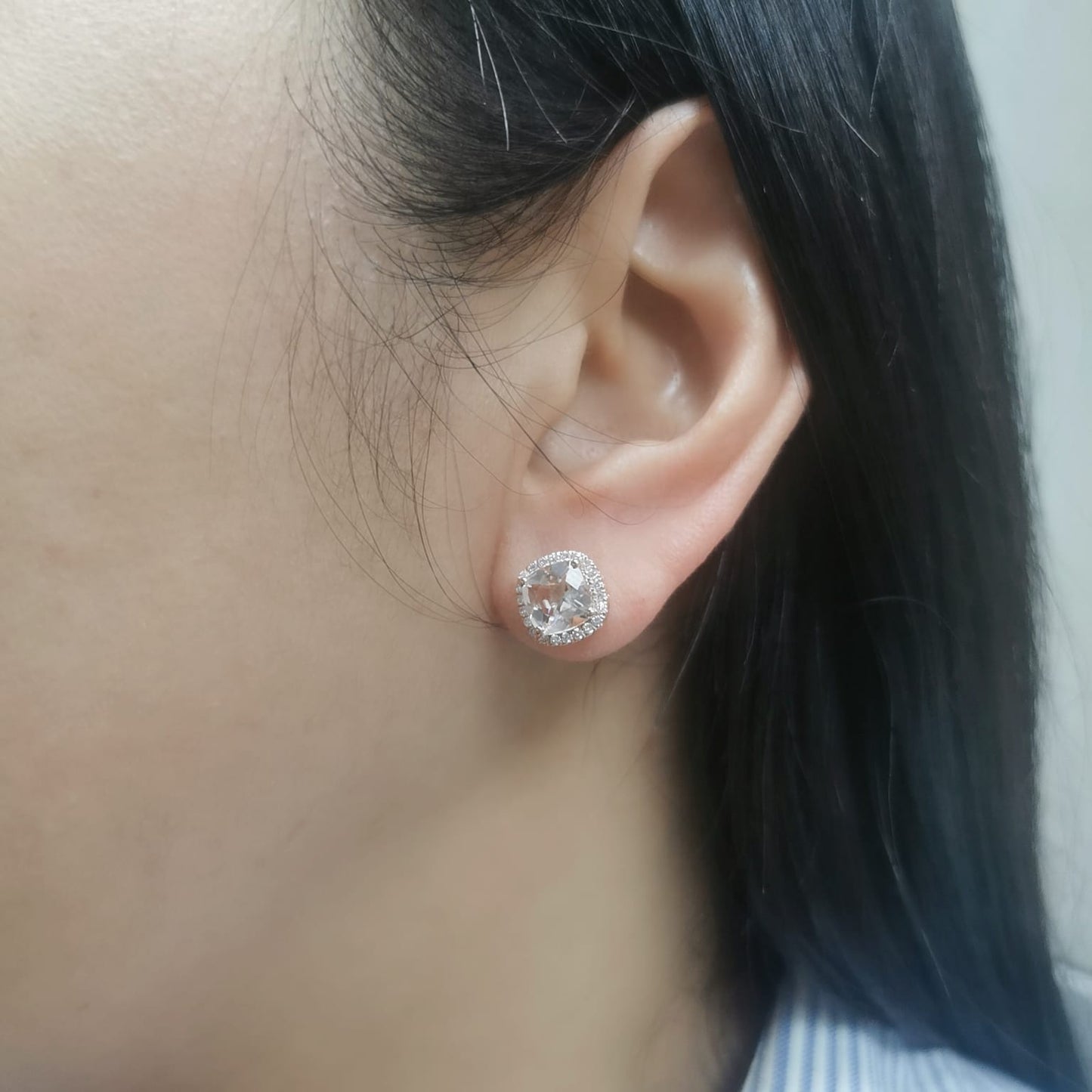 18K rose gold stud earrings with cushion-cut morganites and a diamond halo.