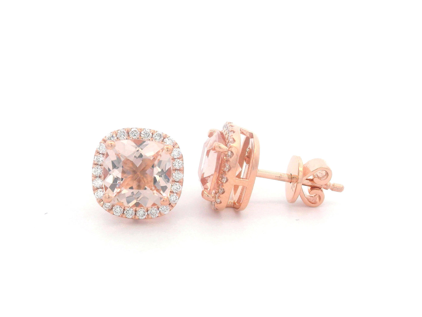 18K rose gold stud earrings with cushion-cut morganites and a diamond halo.