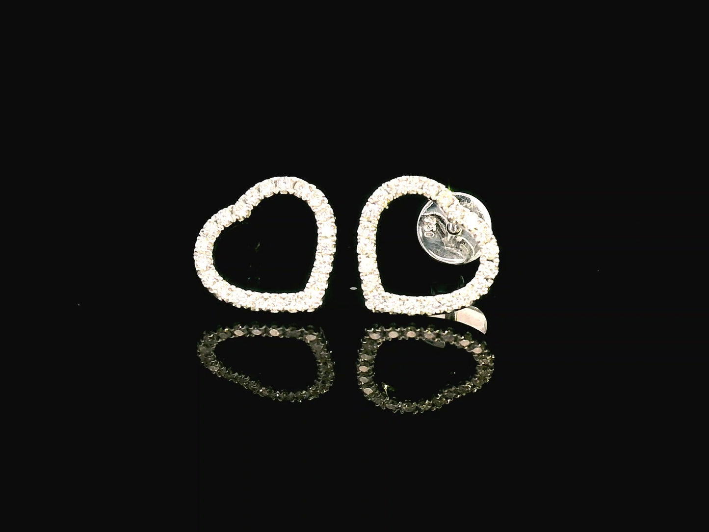 18K white gold diamond heart stud earrings with 0.27 carat round diamonds, elegant and romantic jewelry piece.