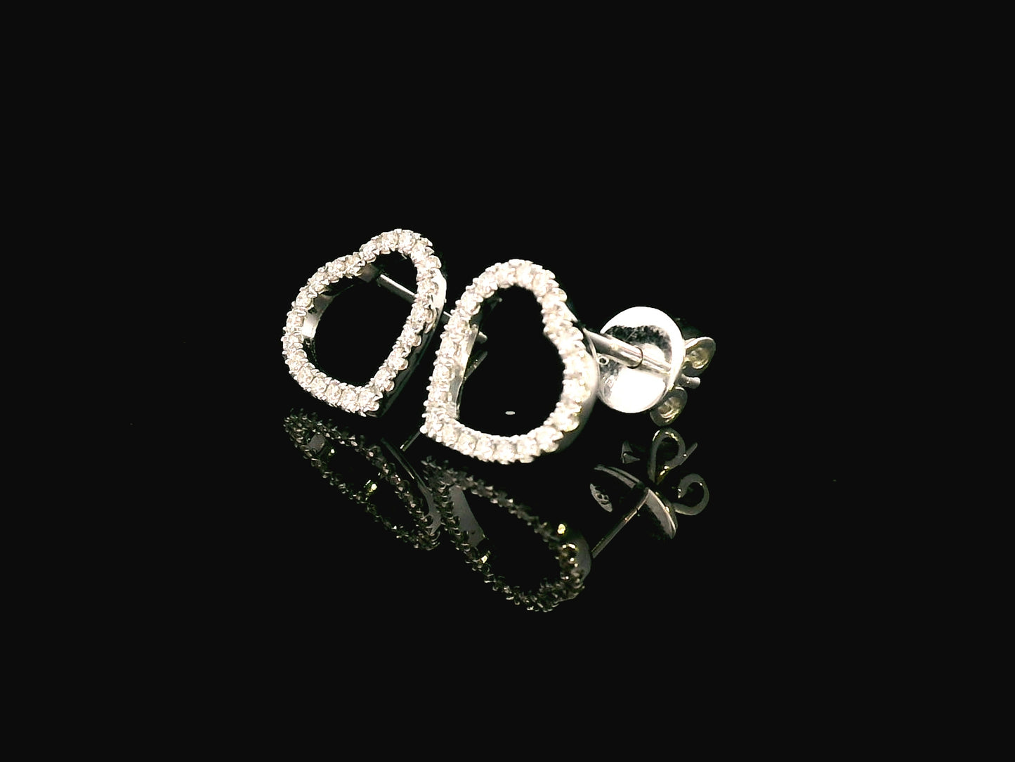 18K white gold diamond heart stud earrings with 0.27 carat round diamonds, elegant and romantic jewelry piece.