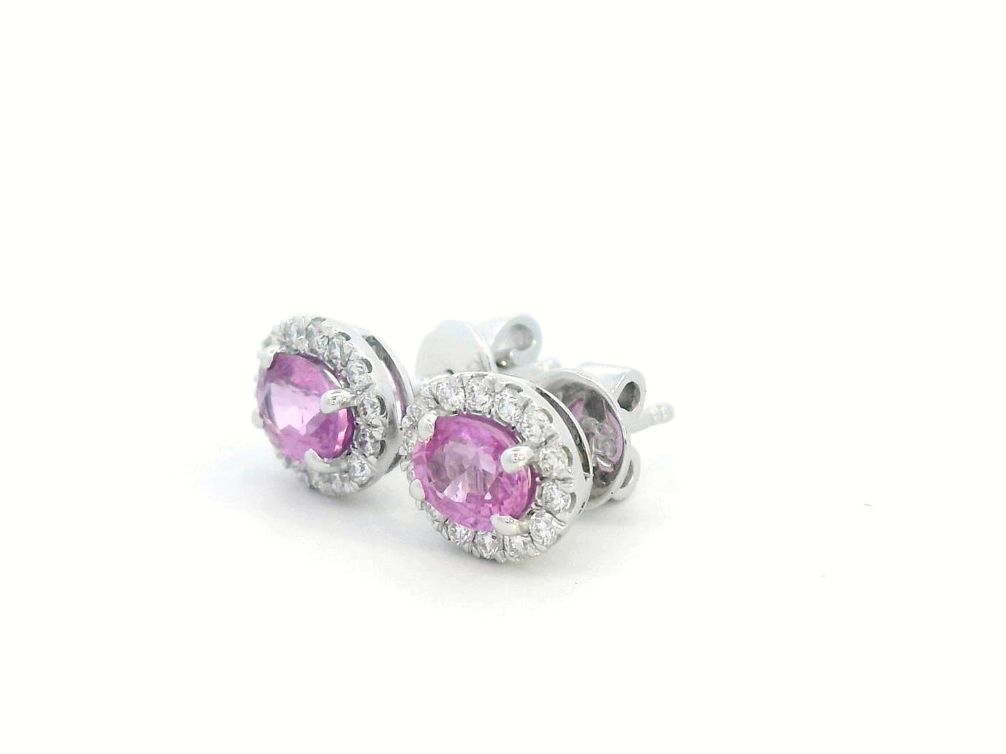 18K white gold oval pink sapphire and diamond halo stud earrings with butterfly push-back closure.
