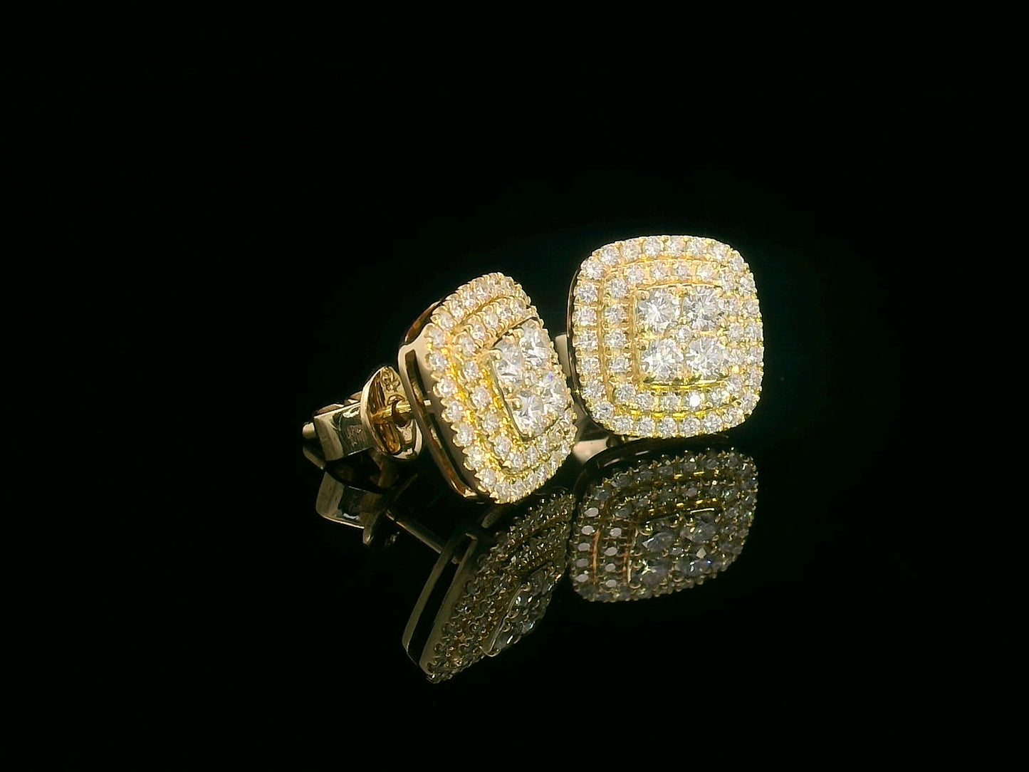 18K gold cushion-shaped diamond stud earrings with double halo, 0.76 carats total.