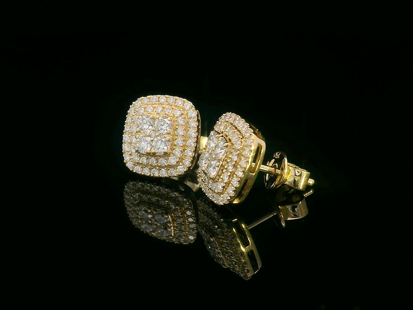 18K gold cushion-shaped diamond stud earrings with double halo, 0.76 carats total.