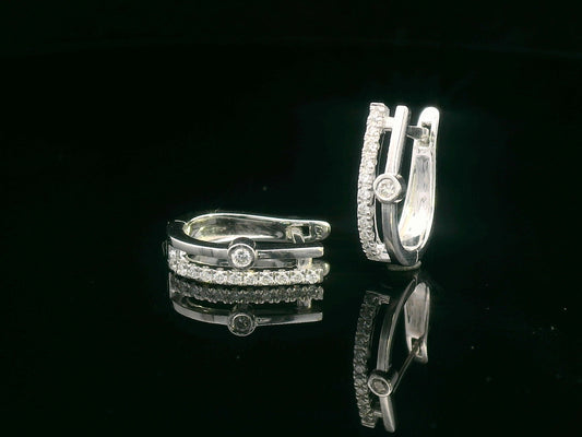 Two-row 18K white gold huggie earrings with pavé and bezel-set diamonds