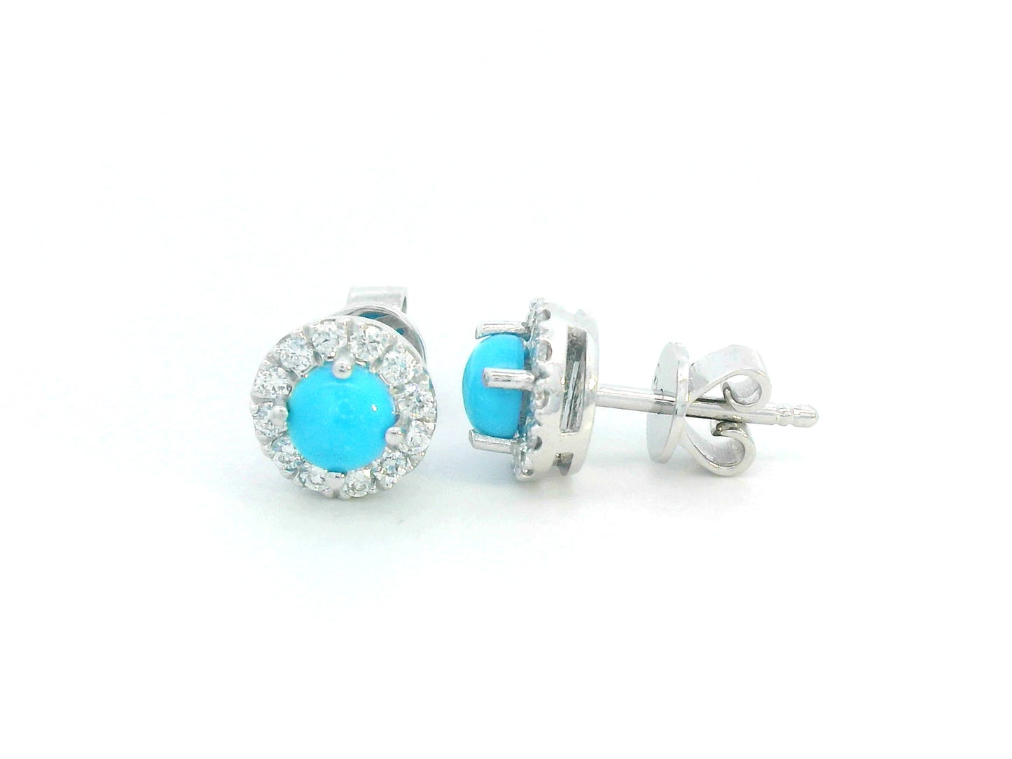 18K white gold stud earrings with round turquoise centers and diamond halo accents.