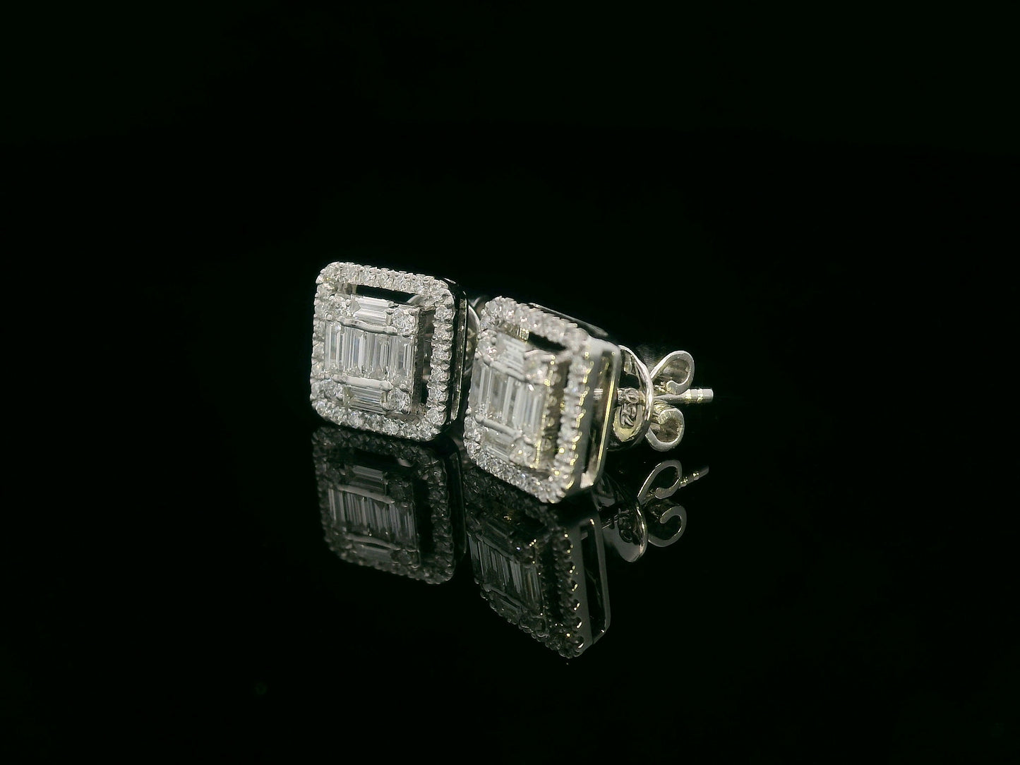 18K gold diamond cluster stud earrings with 0.56 carats of round and baguette-cut diamonds, featuring a secure butterfly back.