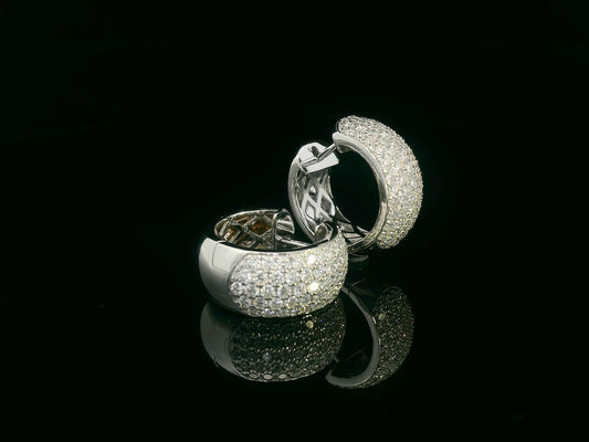 18K white gold pavé diamond huggie hoop earrings with wide dome design and 2.26 carat diamonds