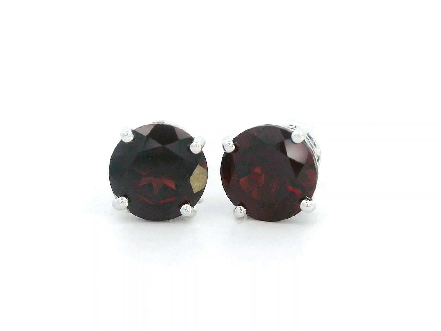 3.89 carat round Garnet stud earrings in 18K white gold with four-prong solitaire setting