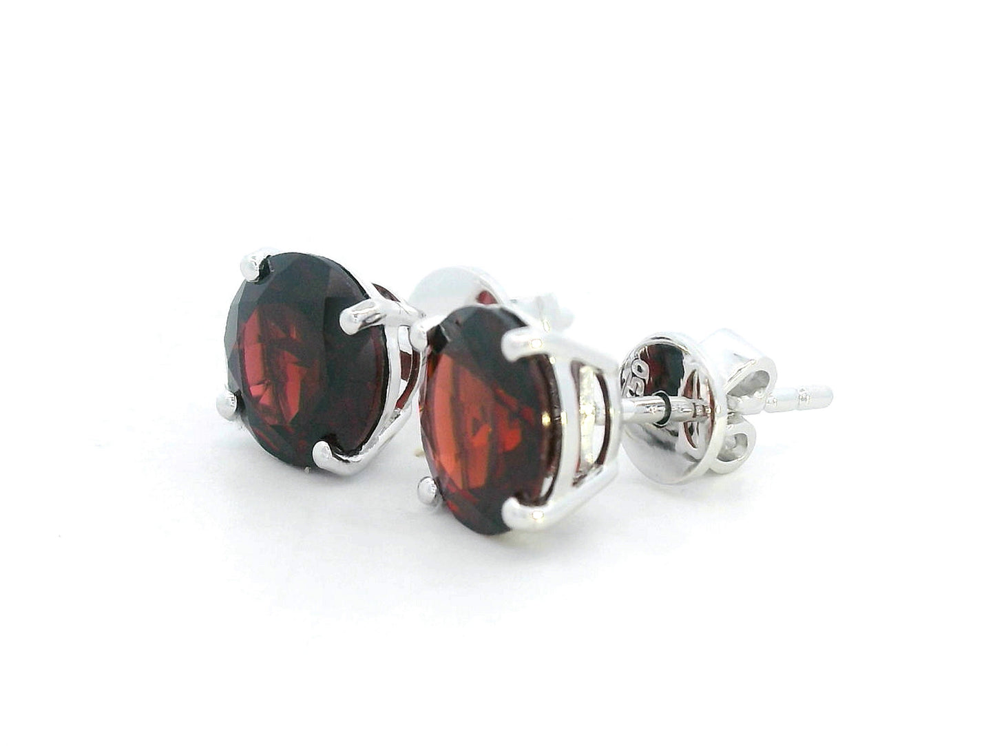 3.89 carat round Garnet stud earrings in 18K white gold with four-prong solitaire setting
